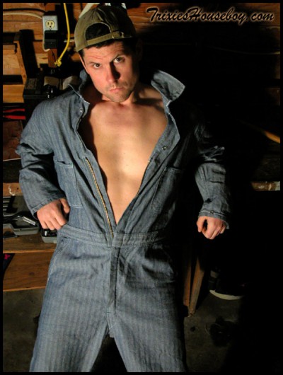 Houseboy in coveralls drinking beer
